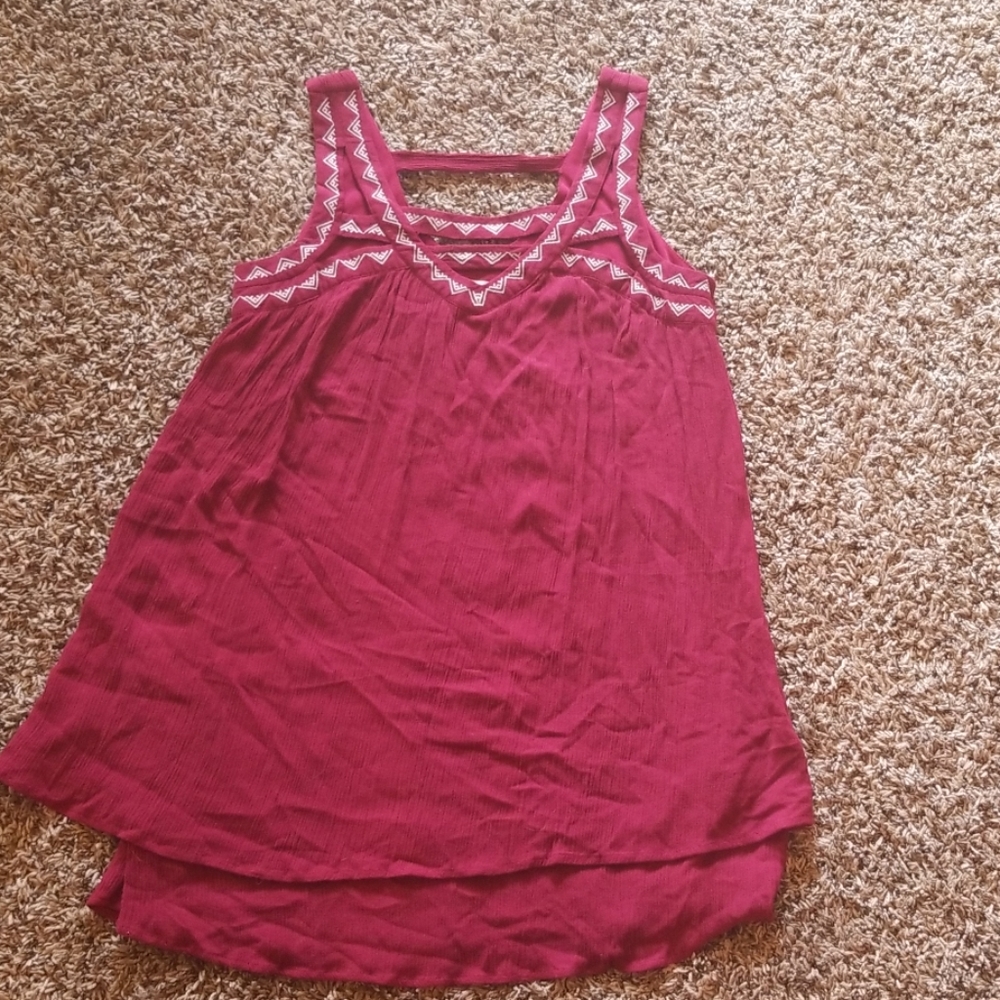Short dress/swim suit cover up or long shirt.